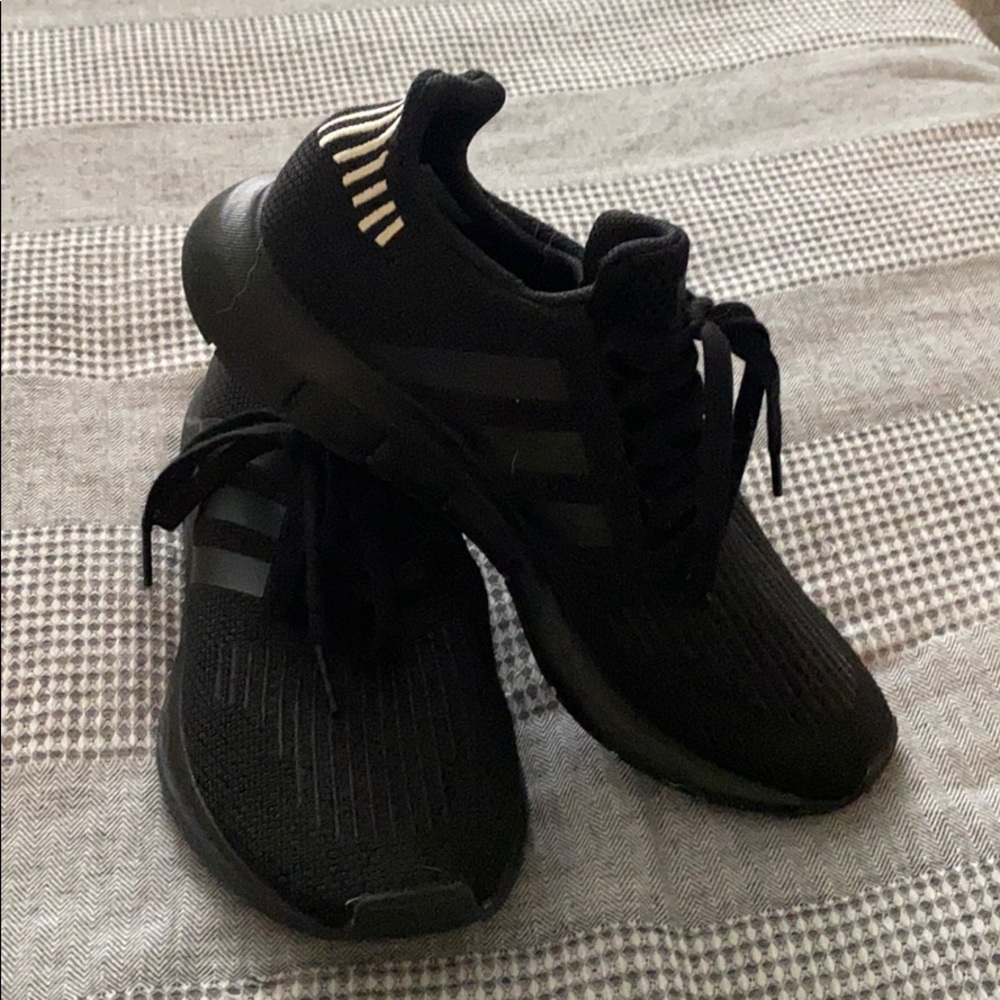 Black Adidas running shoes